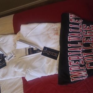 3 PZAS.....(2)SWEATERS AND (1)HIRT